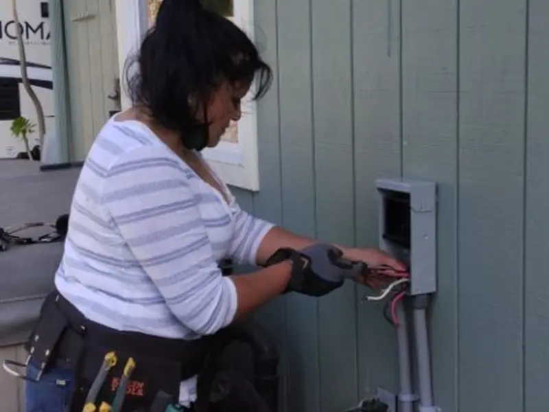 Licensed electrician wiring an exterior subpanel in Mount Repose