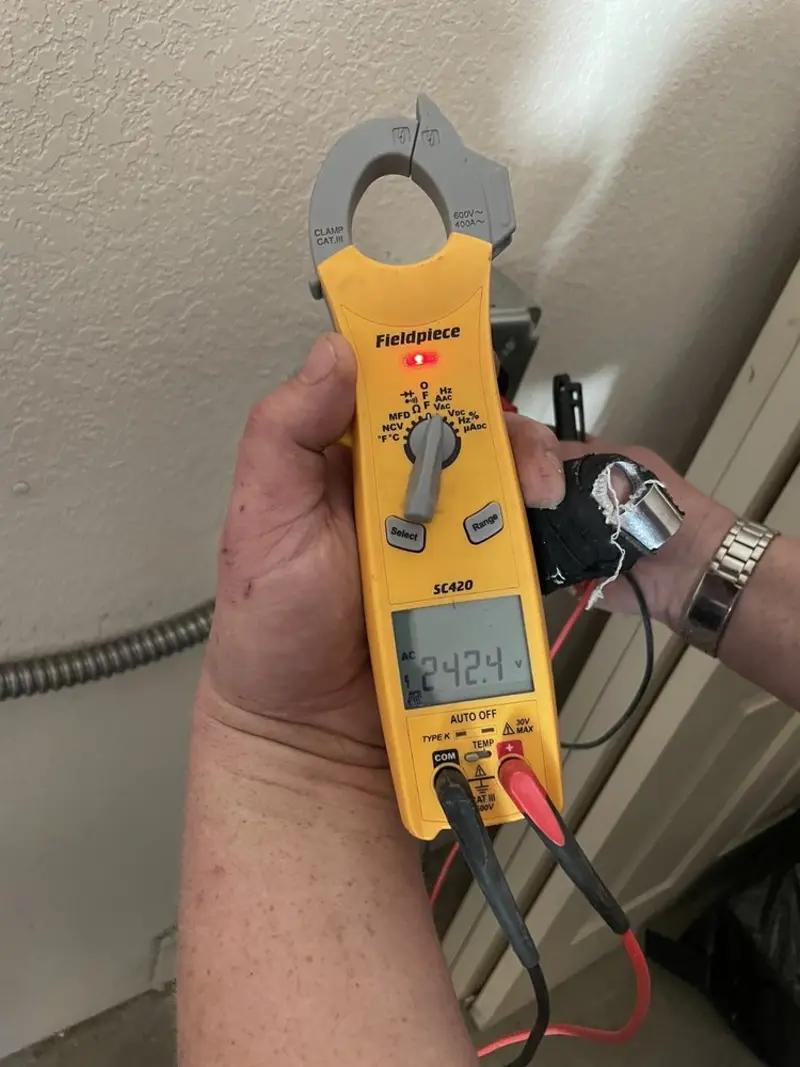 Voltage testing with clamp meter during Aluminum Wiring Replacement in Mount Repose